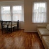 Photo 4: This is the pre-furnished living room 