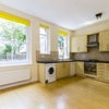 Photo 3: Full kitchen + living area