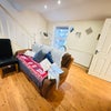 Photo 5: Living area with large windows / Plenty of natural sunlight
