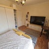 Photo 2: Bedroom / TV / Drawers