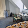 Photo 6: This is how the room could be arranged with furnishings.
