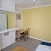 Photo 2: First bedroom with desk
