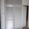Photo 7: En-sutie shower/toilet and walk-in wardrobe