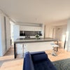 Photo 3: Penthouse sized and style living room. Floor to ceiling windows and gorfeous sunset views.