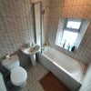 Photo 5: One of two full bathrooms and a separate WC