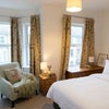 Photo 3: This Room 18 photo is enhanced by AI