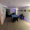 Photo 2: Downstairs Lounge + Pool