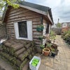 Photo 2: Cabin and patio space