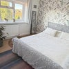 Photo 2: The bedroom with a queen-sized super-comfy bed, is at the front, south-facing, overlooking the close