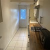 Photo 3: The shared kitchen