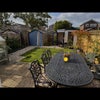Photo 2: Summer house for use and if you like gardening, there’s a vegetable plot at the front of the house