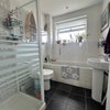 Photo 3: bathroom is shared