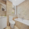Photo 8: Main bathroom with toilet 