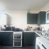 Photo 4: Kitchen - wide view with cooker