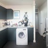 Photo 5: Kitchen - view towards the washing machine