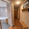 Photo 4: hallway with 2 storage cupboards