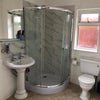 Photo 5: Down stairs bathroom