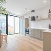 Photo 2: Kitchen through to private garden