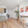 Photo 3: Kitchen through to open plan living