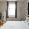 Photo 9: bedroom with leafy view