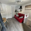 Photo 3: Living room and open plan kitchen