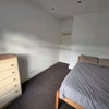 Photo 2: View towards room entrance and chest of drawers