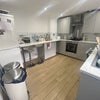 Photo 2: Kitchen with door to garden