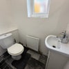 Photo 9: Downstairs Bathroom (Shower not pictured)