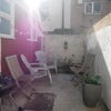 Photo 7: Patio, we planted flowers all together, you'll see them bloom :)