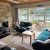 Photo 2: Communal lounge with river view