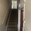Photo 9: Staircase to first floor / hallway 