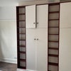 Photo 3: The wardrobe is deep and you can hang clothes inside