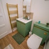 Photo 8: bathroom with full bath