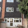 Photo 5: Rear garden with seating area and storage