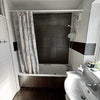 Photo 4: Shower/bathroom