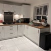 Photo 7: Shared kitchen with washing machine