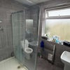 Photo 16: Shared bathroom 