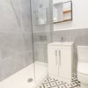 Photo 3: Upstairs bathrooms x2