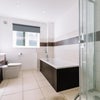 Photo 3: Main Bathroom complete w/ Bath & Power Shower (shared w/ 1 person only)