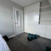 Photo 3: Room 2 — built-in wardrobe and shelving