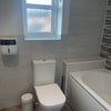 Photo 5: Shared family bathroom 
