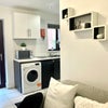 Photo 16: Our kitchen is fully equipped and includes washer dryer