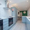 Photo 2: KITCHEN/COMMUNAL SPACE 