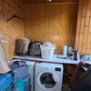 Photo 9: Shared washing machine and iron box