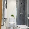 Photo 4: AI enhanced photo Room 2 En-Suite
