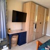 Photo 6: Wardrobe and table 