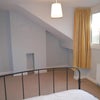 Photo 2: Huge L-shaped bedroom with loads of space for additional furniture like a desk, sofa, armchair etc