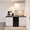Photo 4: Fridge freezer, toaster, kettle, microwave 