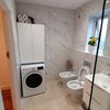 Photo 3: Bath room with bidet and washing machine