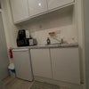 Photo 3: The kitchen is on the landing it is only for basic simply cooking